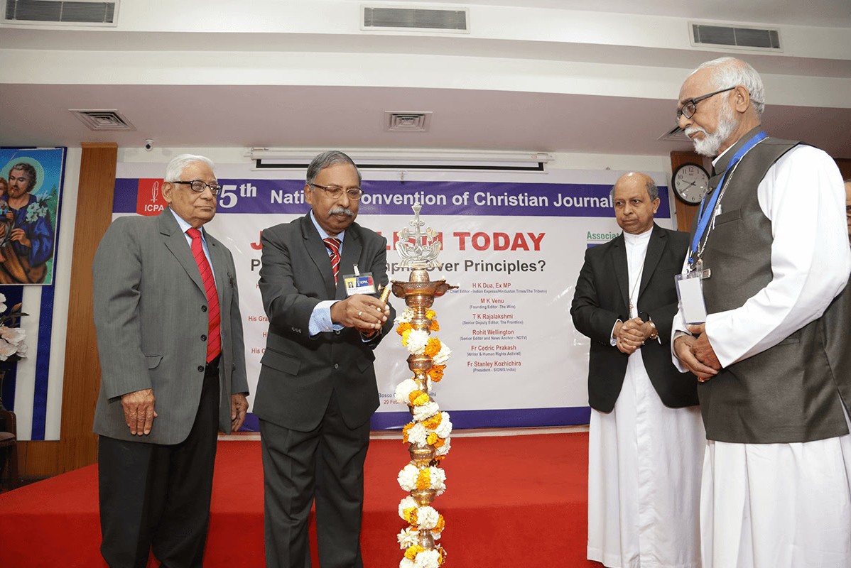 ICPA President Ignatius Gonsalves lights the lamp